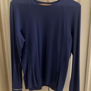 Ribbed long sleeve with reflective wrists.